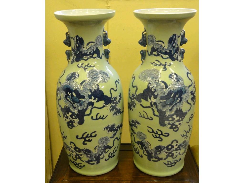 Appraisal: A pair of oriental vases with blue and white decoration