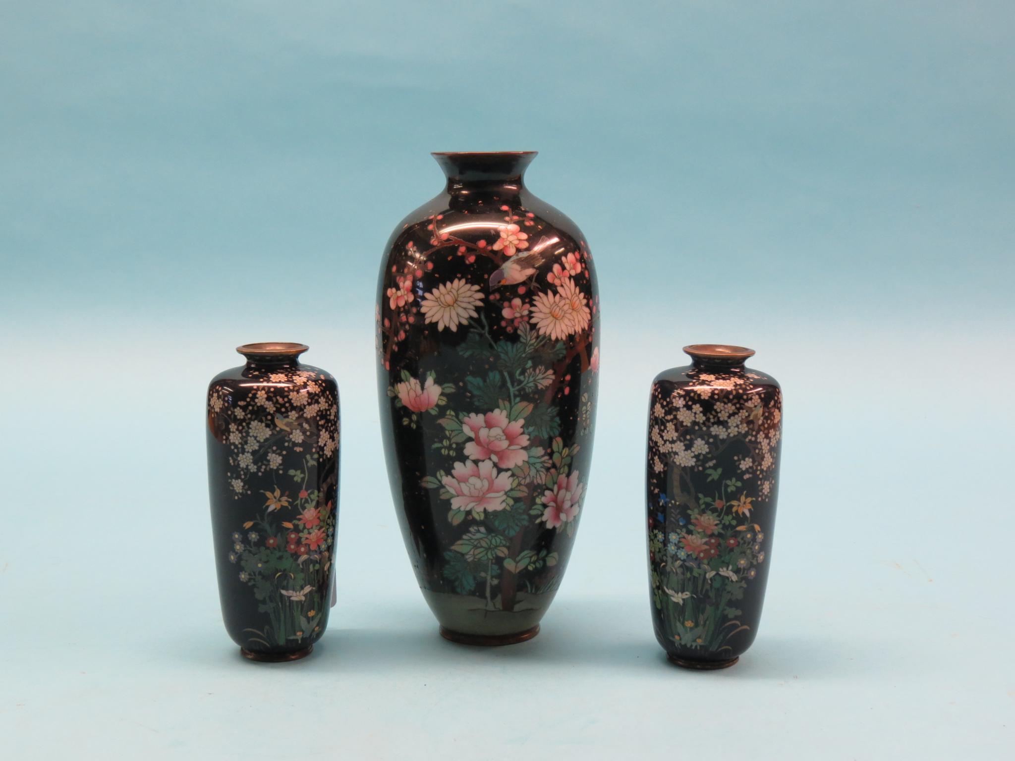 Appraisal: A pair of cloisonne vases tapering ovoid form with bright