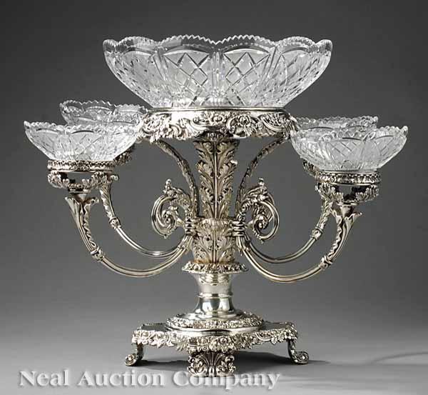 Appraisal: A Late Georgian Sheffield Epergne c exuberant foliate scroll shell