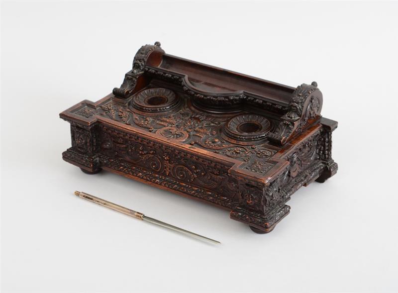 Appraisal: RENAISSANCE STYLE CARVED WALNUT INKSTAND Carved in relief with cornucopia