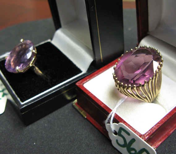 Appraisal: TWO AMETHYST AND FOURTEEN KARAT GOLD SOLITAIRE RINGS both oval-cut