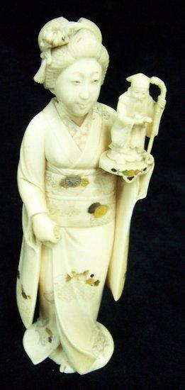 Appraisal: A Japanese carved ivory and shibayama figure of a lady