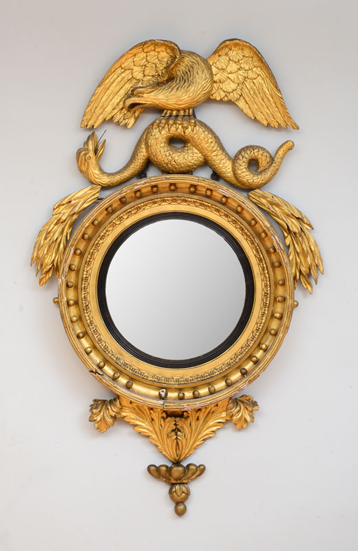 Appraisal: FINE REGENCY GILTWOOD CONVEX MIRROR With eagle and serpent crest