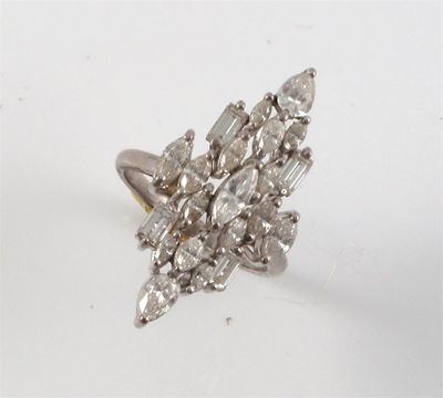 Appraisal: A diamond cluster ring set with marquise pear and baguette