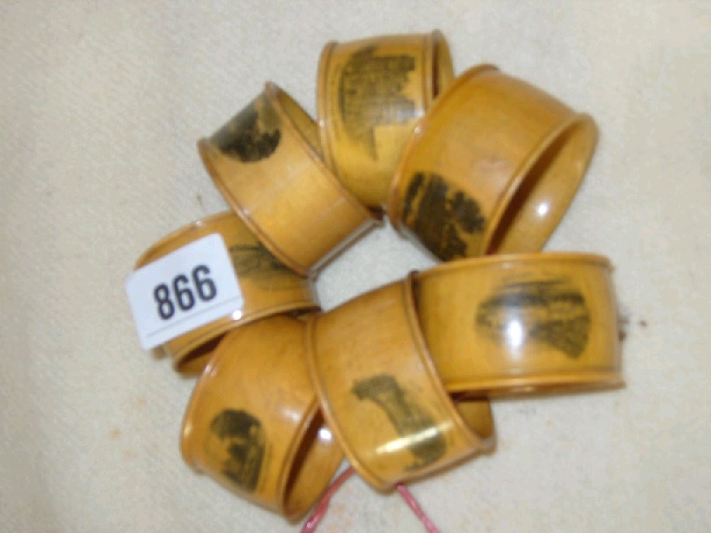 Appraisal: A collection of seven Mauchline ware napkin rings comprising The