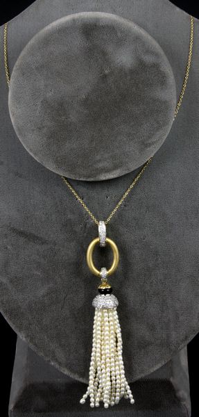 Appraisal: k yellow gold pearl and diamond pendant D ct oz