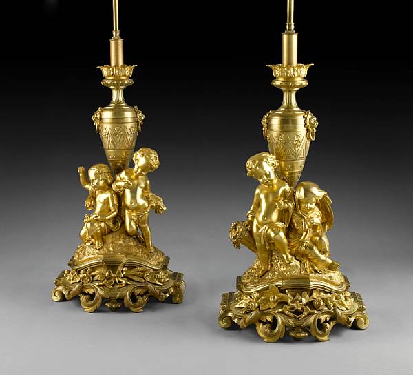 Appraisal: A pair of Louis XV style gilt bronze table lamps