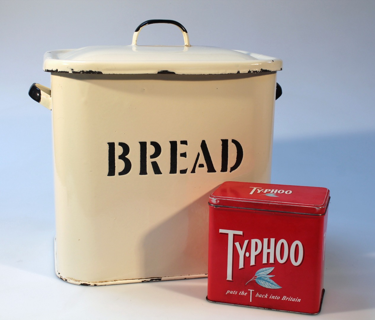 Appraisal: An enamel bread bin with removable lid and fixed handles