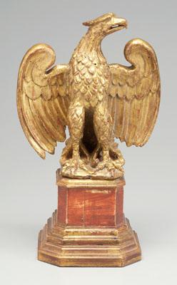 Appraisal: Gilt eagle on stand carved and gilt spread-wing eagle mounted