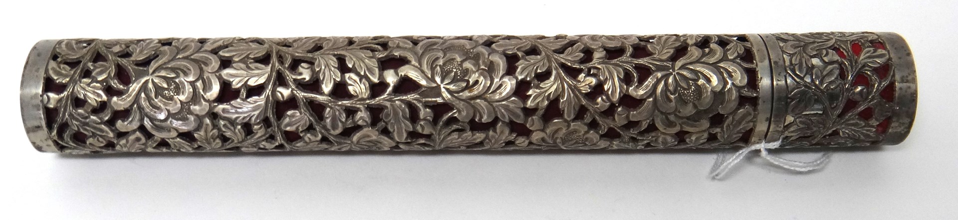 Appraisal: A cylindrical scroll holder with floral pierced and engraved decoration