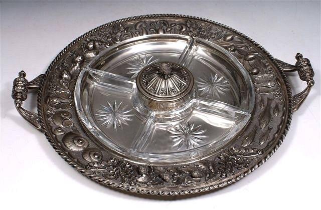 Appraisal: A CONTINENTAL SILVER HORS D'OEUVRES TRAY with cut glass dishes