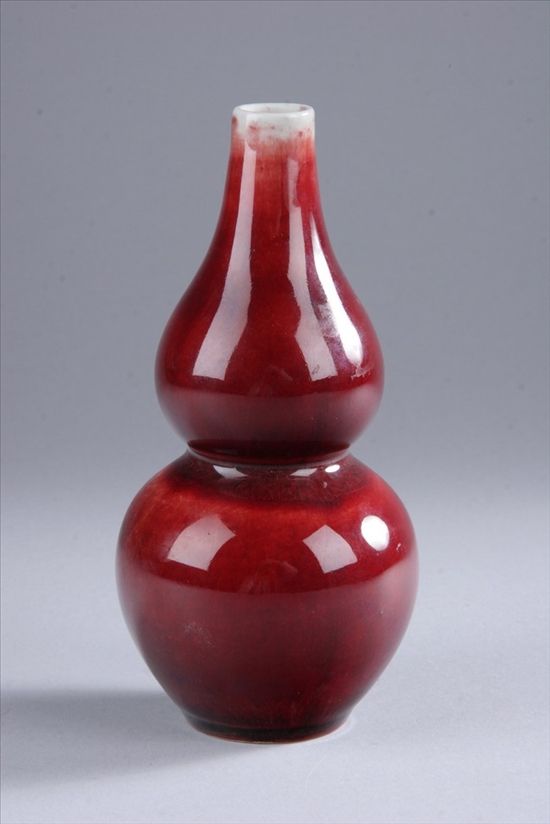 Appraisal: CHINESE COPPER RED PORCELAIN DOUBLE GOURD VASE Qianlong four-character underglazed