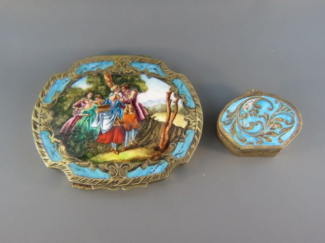 Appraisal: Enameled Silver Boxes compact with romantic scene and oval blue