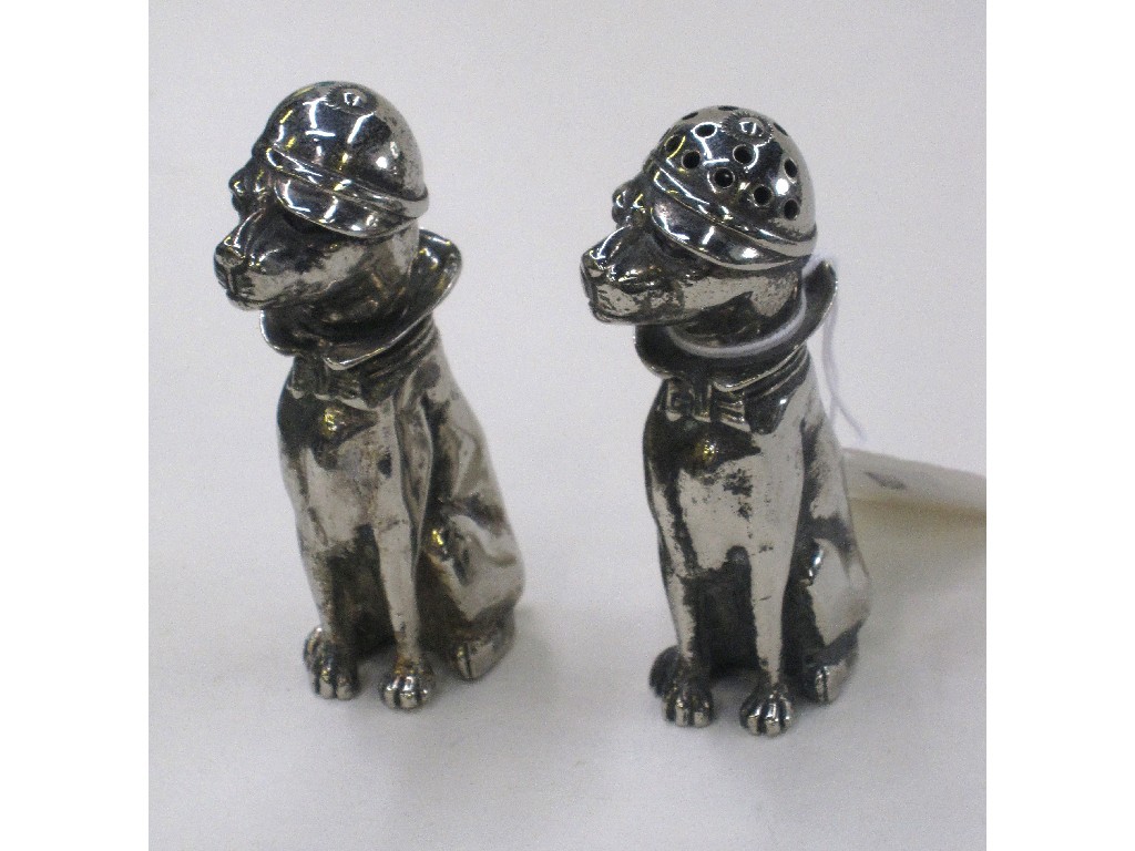 Appraisal: Pair of novelty white metal salt and pepper modelled as