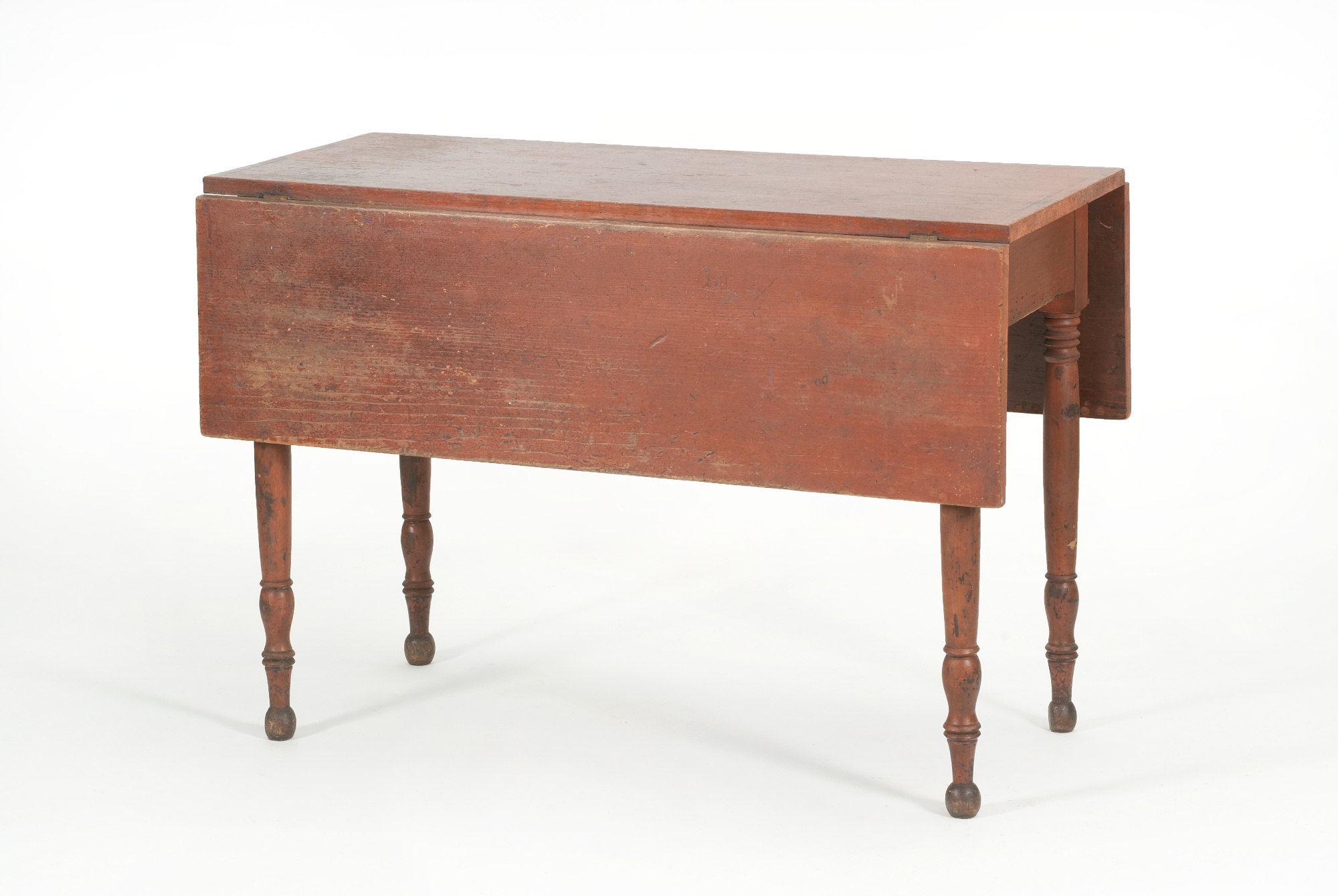 Appraisal: DROP-LEAF TABLE th CenturyIn pine under red paint Turned wooden