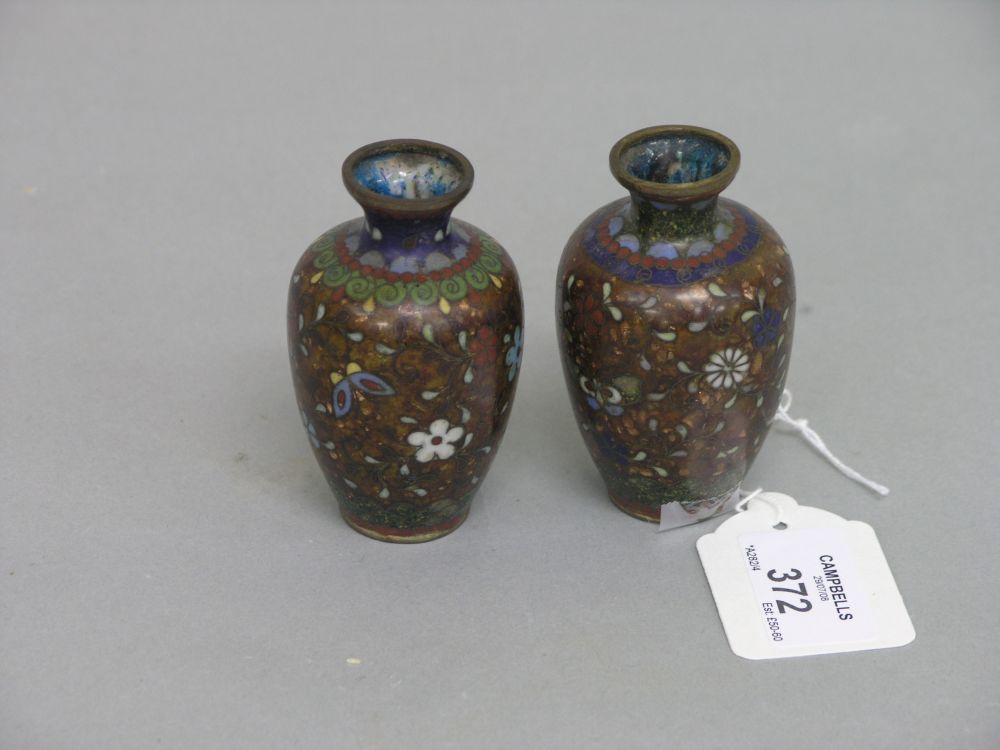 Appraisal: A pair of th century Japanese miniature cloisonne vases enamelled