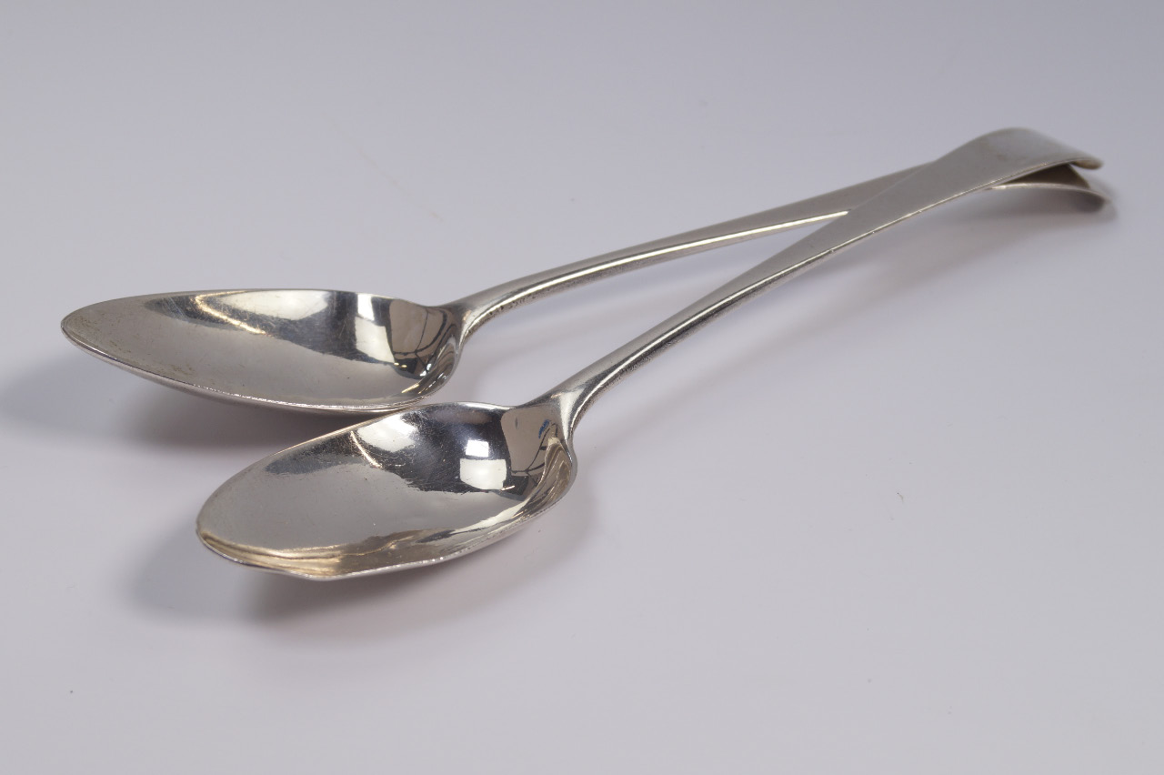 Appraisal: A pair of George III silver serving spoons with Old