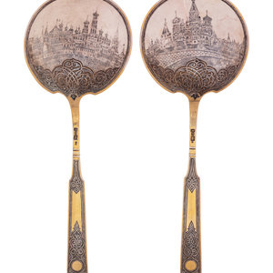 Appraisal: A Pair of Russian Niello Silver-Gilt Serving Spoons Mark of