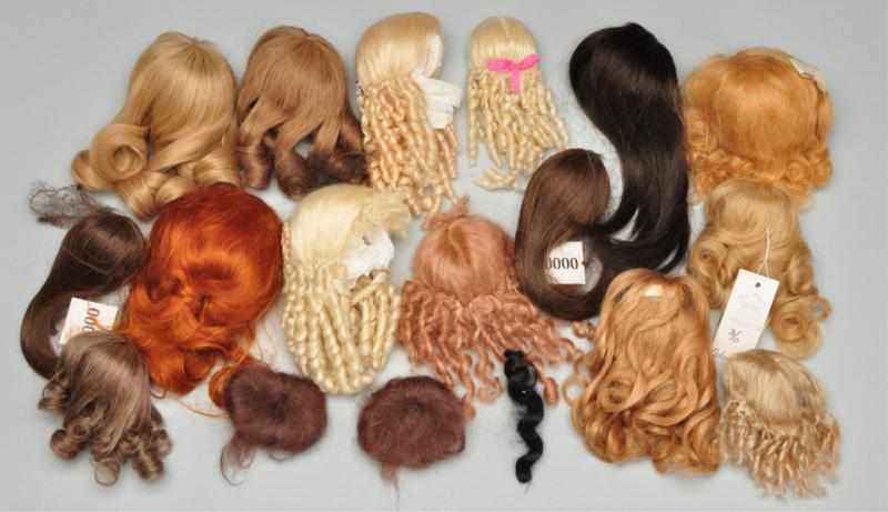 Appraisal: Lot of Wigs for Antique Dolls Description French human hair