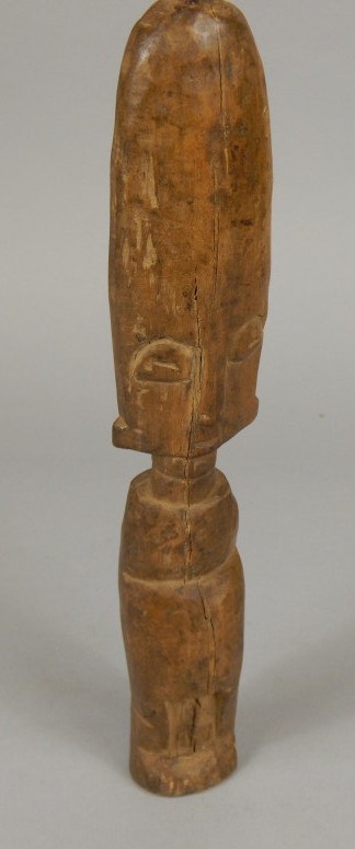 Appraisal: Tribal Art An African carved wooden with elongated forehead cm