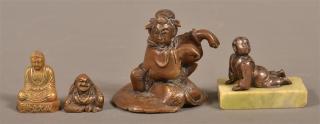 Appraisal: Four Vintage Bronze or Brass Small Oriental figures to h