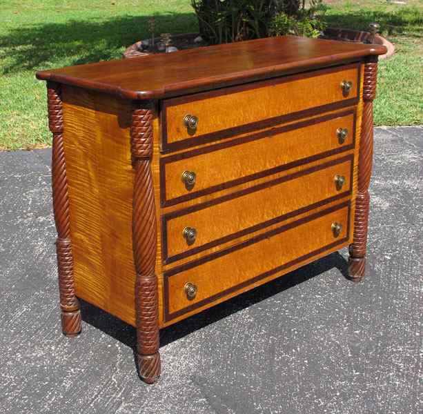 Appraisal: TIGER MAPLE CHEST OF DRAWERS Banded curly maple drawer fronts