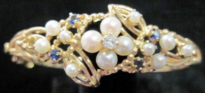 Appraisal: karat yellow gold pearl sapphire and diamond bracelet Center petite