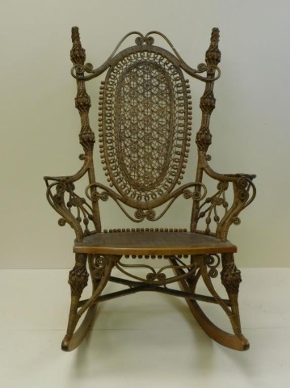 Appraisal: rocking chair late th c Star caned oval panel on