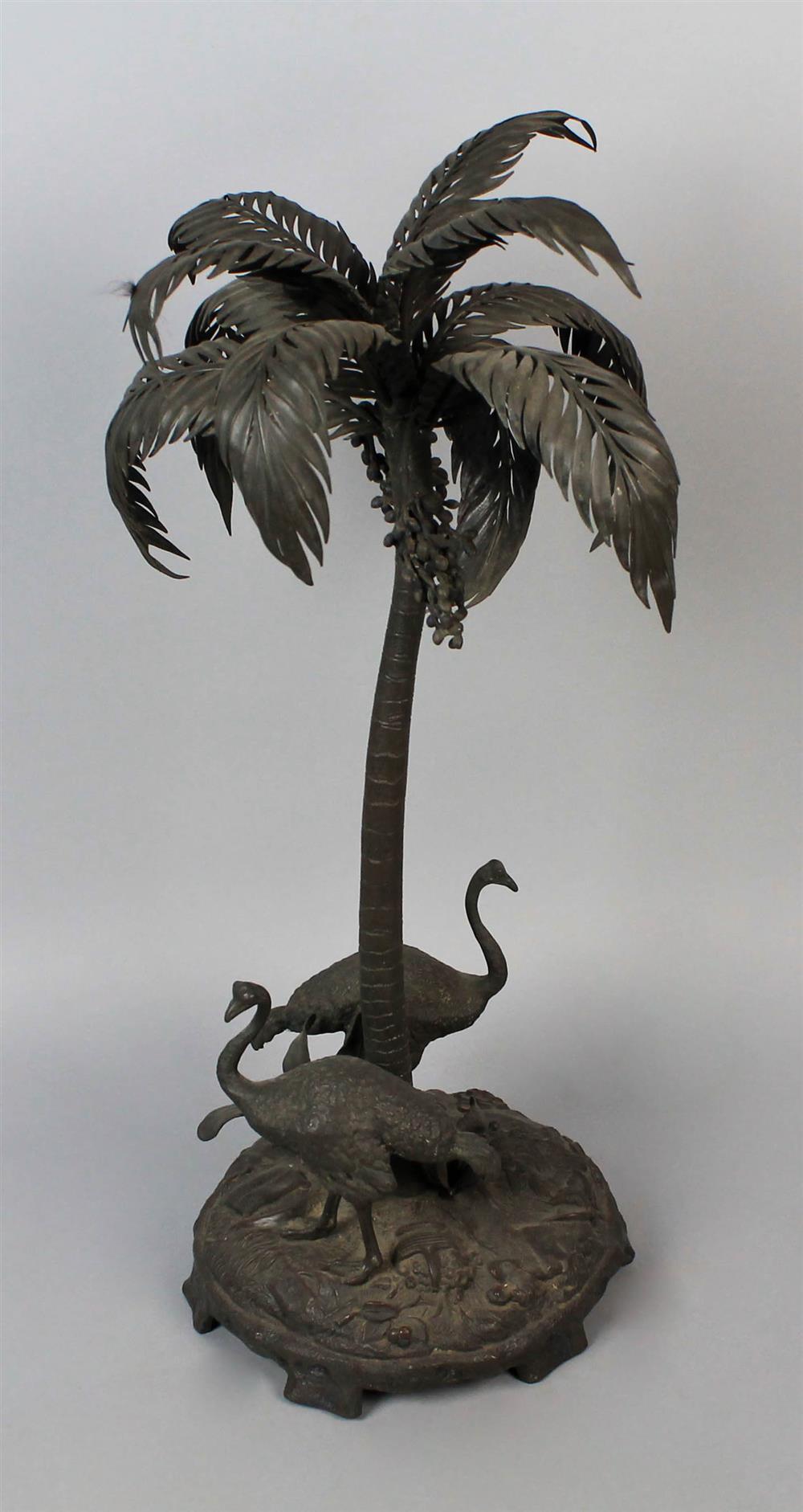 Appraisal: BRONZED METAL SCULPTURE OF OSTRICH AROUND PALM LATE TH C