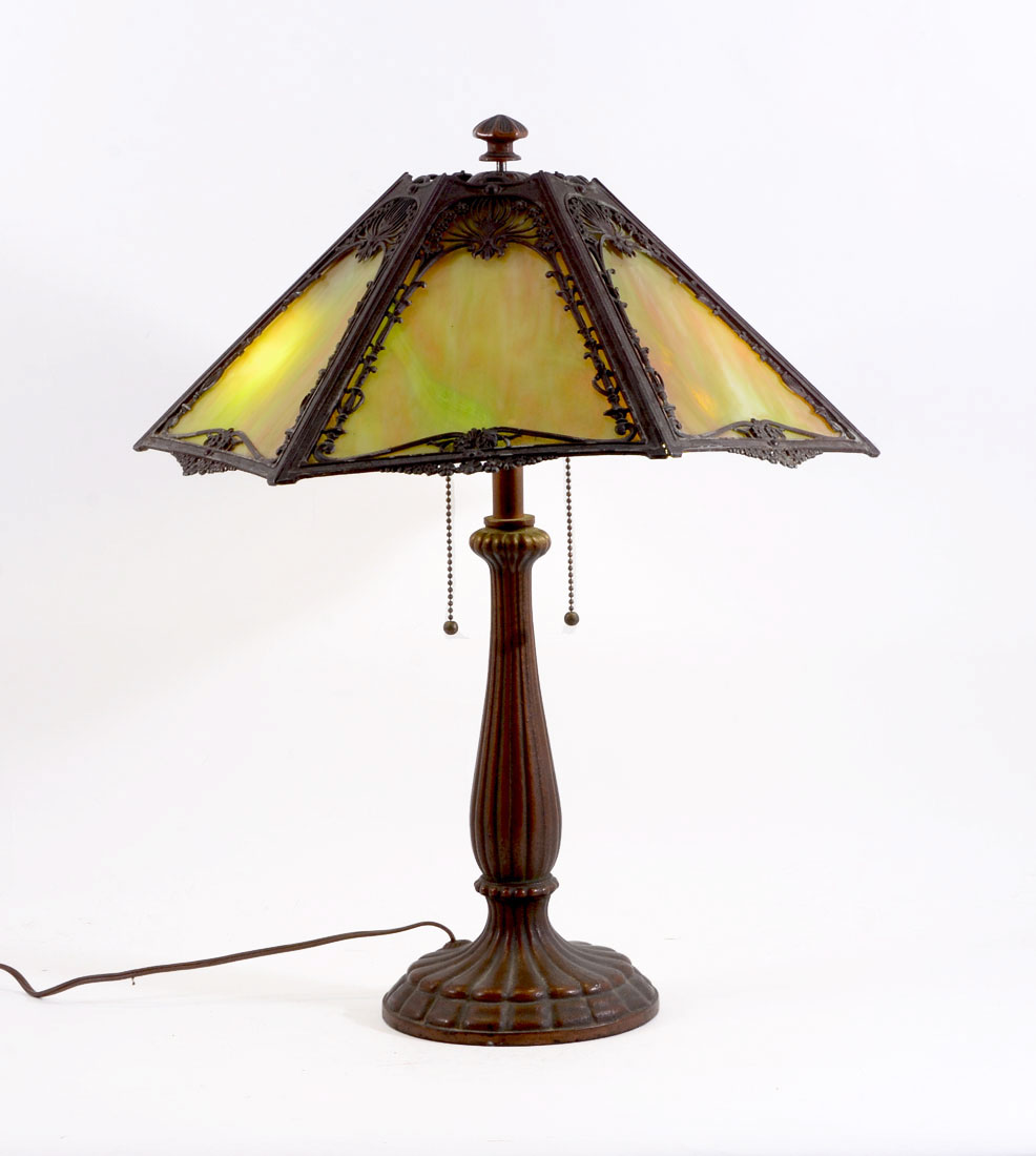 Appraisal: CAST IRON GREEN SLAG GLASS LAMP Unmarked fluted patinated cast