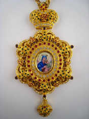 Appraisal: A Russian gilt metal religious pendant and chain the centre