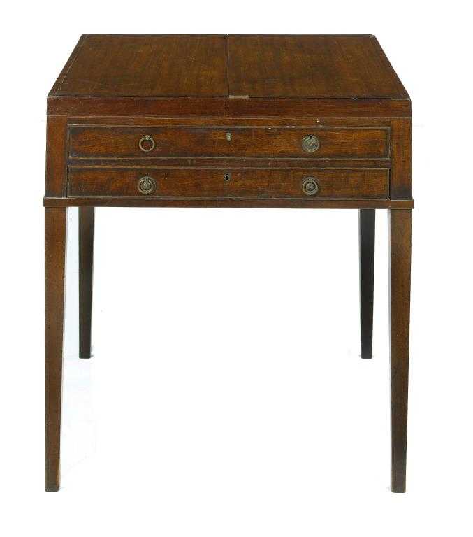 Appraisal: A GEORGE III MAHOGANY ENCLOSED DRESSING TABLE the fitted interior