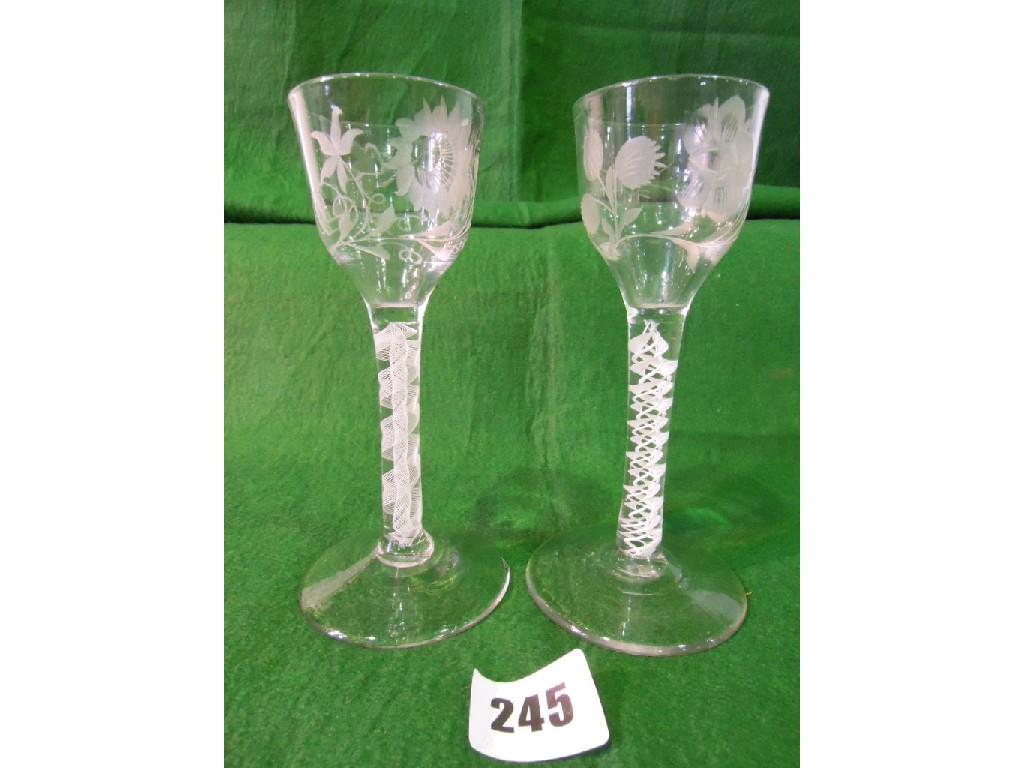 Appraisal: Two Georgian drinking glasses with opaque spiral twist stems and