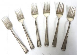 Appraisal: Cartier Scroll Bead Dessert Forks With a classical design of