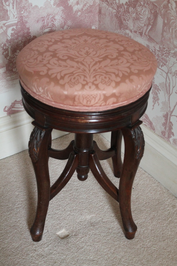 Appraisal: A Victorian mahogany music or dressing table stool with circular