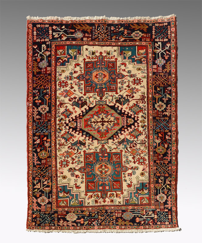 Appraisal: APPROX - YR OLD PERSIAN HERIZ HAND KNOTTED WOOL RUG