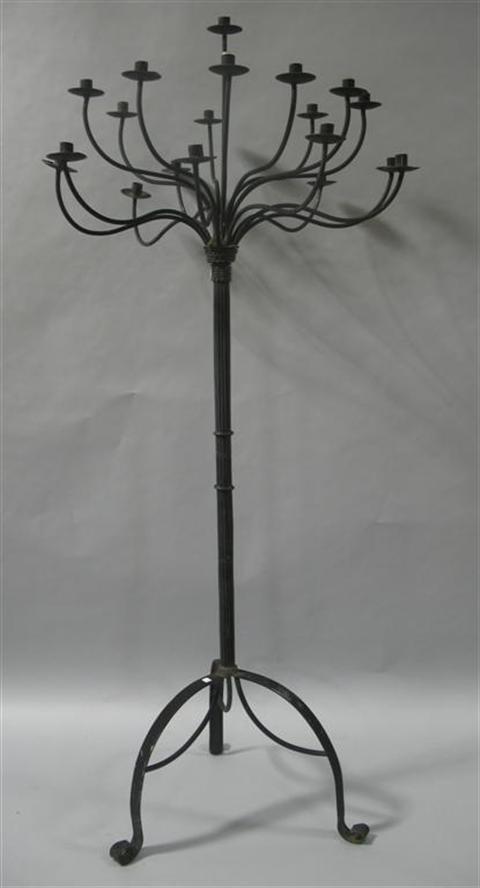 Appraisal: BLACK PAINTED WROUGHT IRON CANDELABRA The arms extending from a