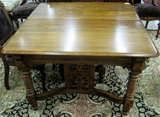 Appraisal: VICTORIAN DINING TABLE WITH THREE LEAVES Eastlake design American c