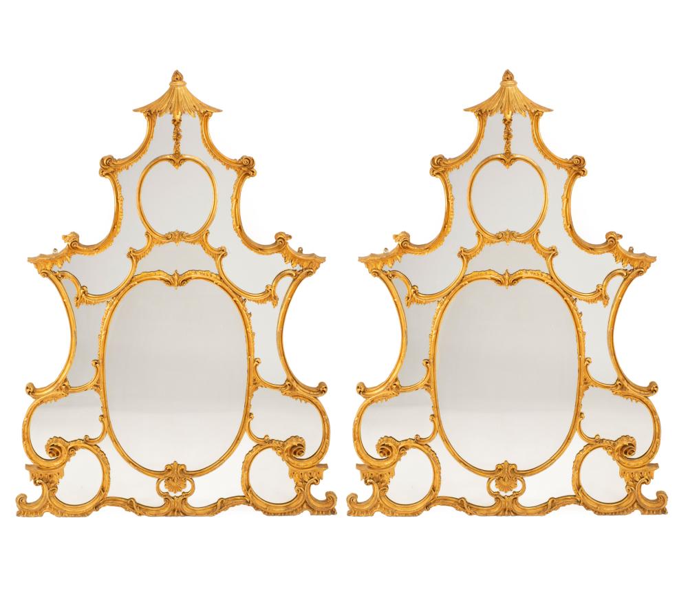 Appraisal: Pair of Chippendale-Style Carved Giltwood Mirrors pagoda pediment foliate scrolled