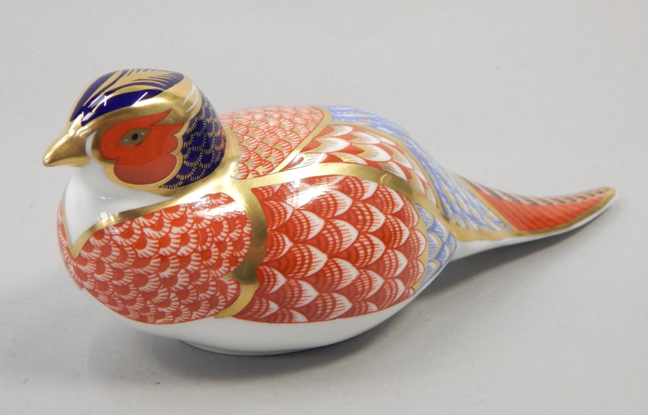 Appraisal: A Royal Crown Derby porcelain Imari pattern pheasant silver button