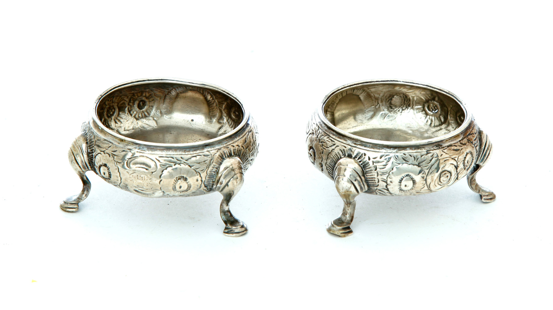 Appraisal: PAIR OF ENGLISH GEORGIAN SILVER SALTS Eighteenth century London hallmarks