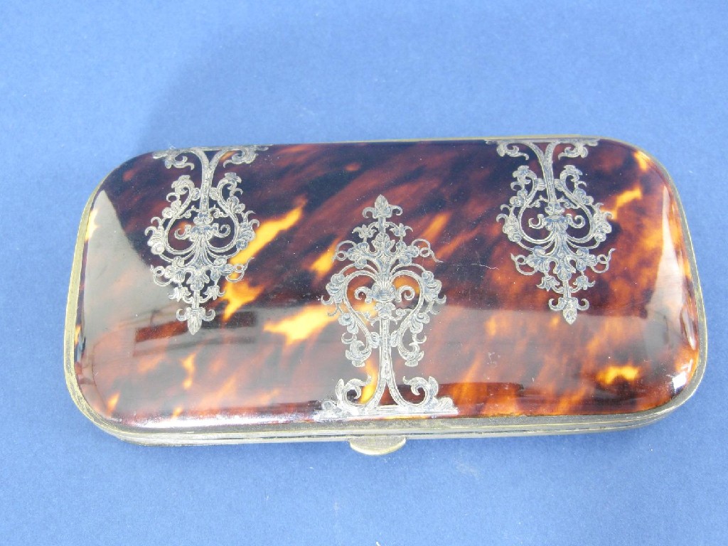 Appraisal: A tortoiseshell framed Purse with scroll inlay