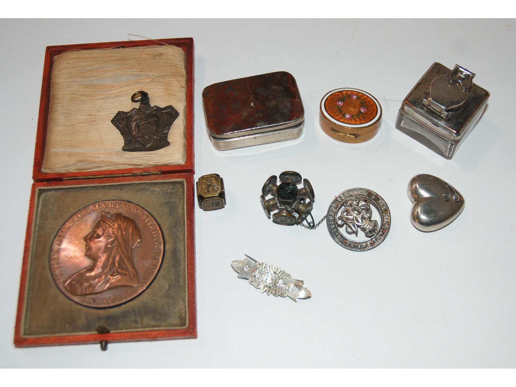 Appraisal: A lot comprising a Victorian bronze medallion pill boxes travel