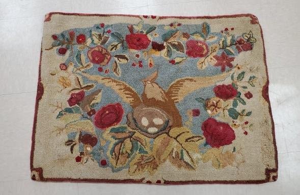 Appraisal: Antique c s hooked rug with a blue jay and