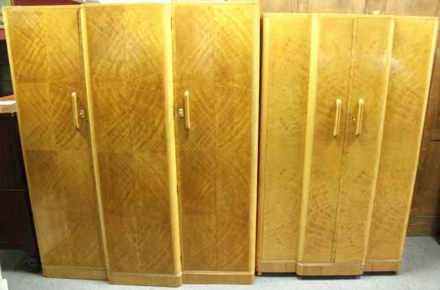 Appraisal: Two satin birch breakfront wardrobes