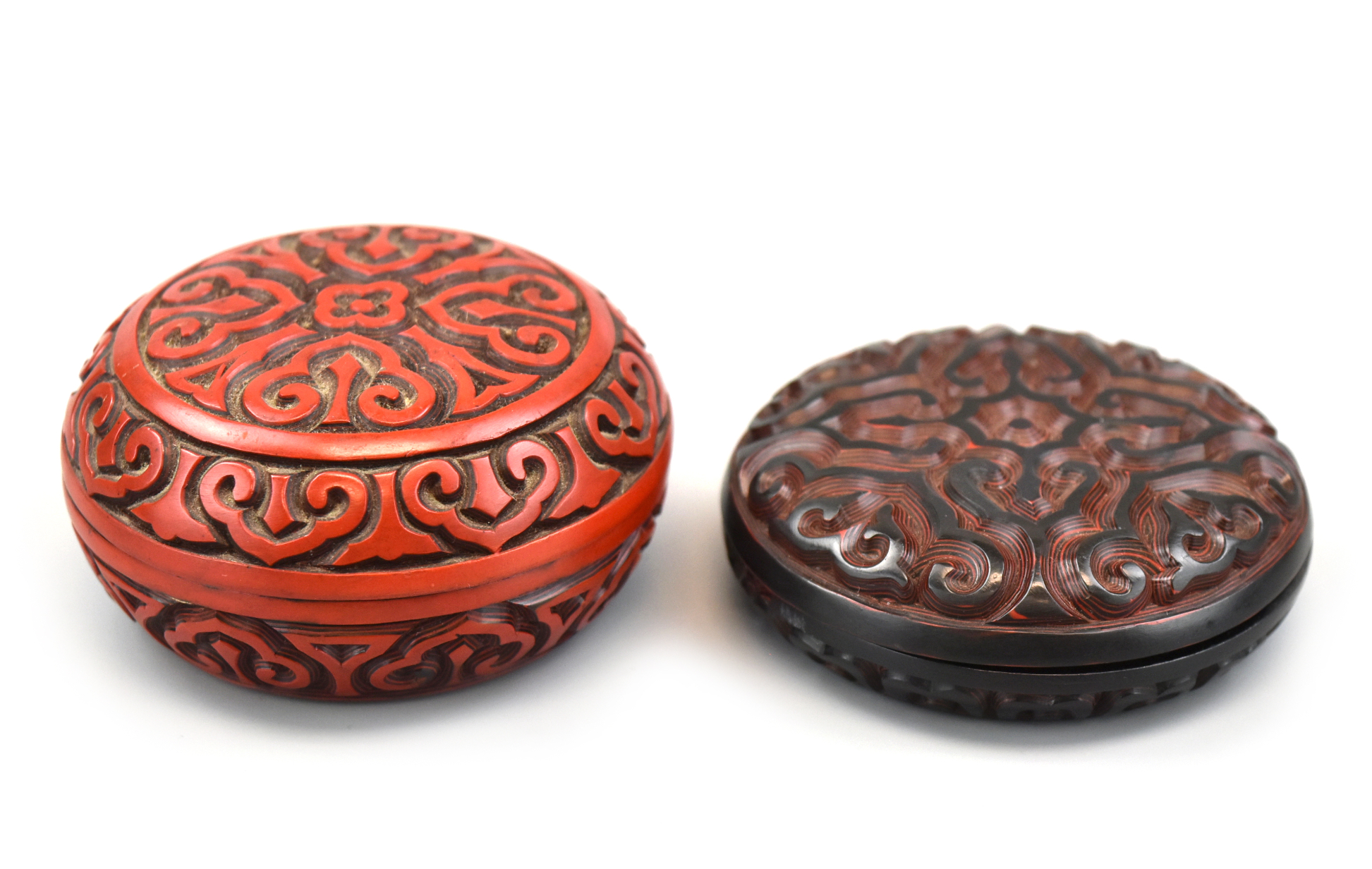 Appraisal: Two Chinese carved lacquer circular boxes each with a different