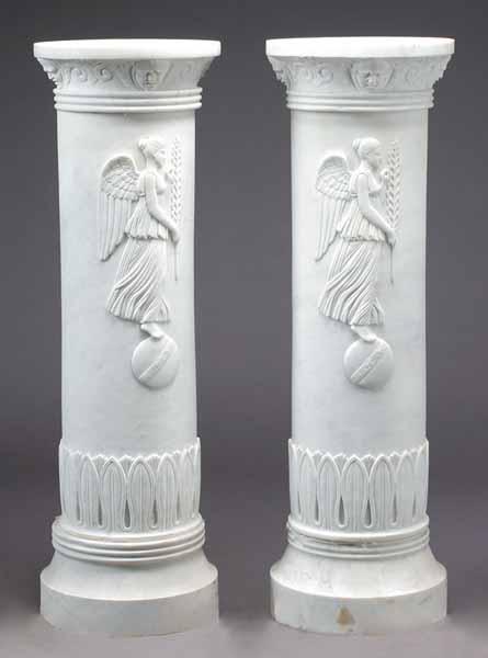 Appraisal: A Pair of Neo-Classical-Style Carved White Marble Pedestals with winged