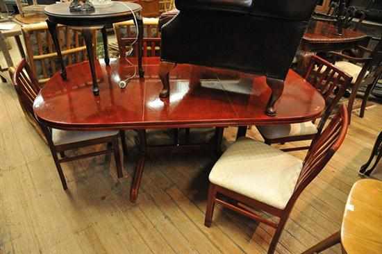 Appraisal: AN EXTENDING DINING TABLE AND SIX CREAM UPHOLSTERED CHAIRS