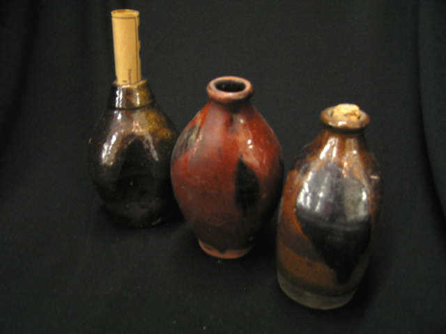 Appraisal: Early Stoneware Redware Flasks scarce