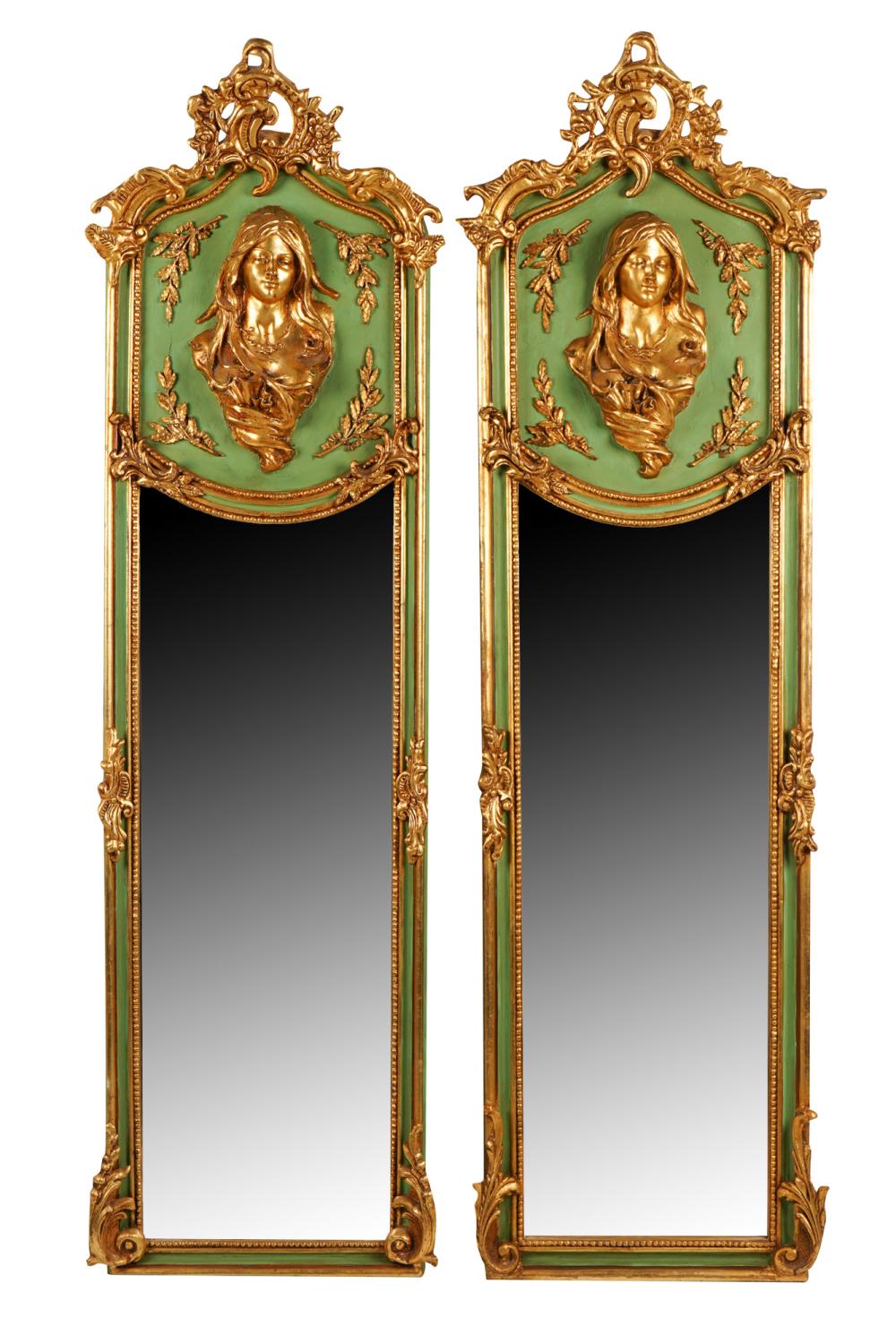 Appraisal: TWO GREEN-PAINTED GILT CARVED TRUMEAU MIRRORSmodern each with a carved